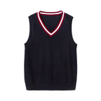 Everanne cotton V-neck school uniform sweater vest with blue and red striped collar detail on a cream background.