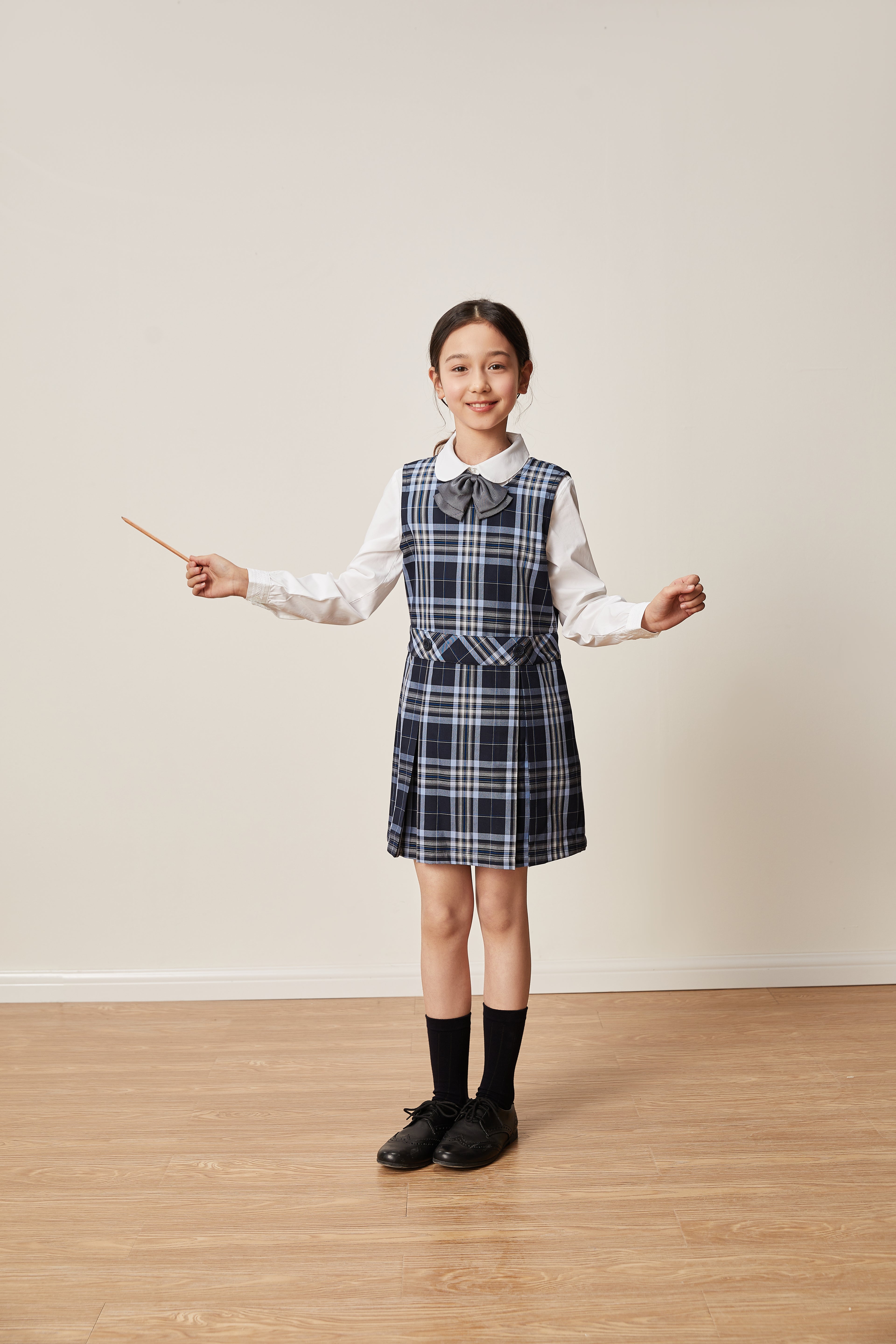Everanne girls' navy plaid school uniform jumper dress with a pleated skirt, perfect for school or casual wear.