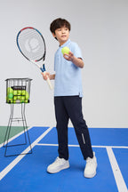 Unisex kids light blue polo shirt by Everanne with short sleeves and cotton blend pique mesh fabric, casual and comfortable.