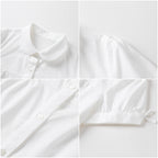 Everanne girls short-sleeve white summer shirt with classic puff sleeves, casual top perfect for warm weather.