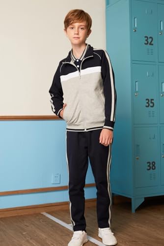 Everanne youth sports zip-up jacket with stand collar, colorblock navy and light gray stripes, ideal for active wear.