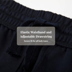 Everanne slim tapered blue jogger sweatpants with elastic waist and cuffed hems, made of cotton and nylon fabric.
