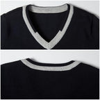Everanne unisex black V-neck pullover sweater with stripe trim, cotton material, and windproof cuffs for a stylish, cozy look.