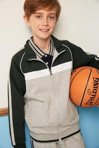 Everanne youth sports zip-up jacket with stand collar, colorblock stripes in dark green and light gray, suitable for active wear.