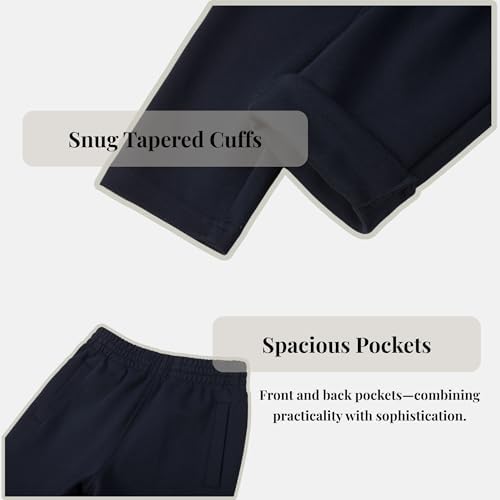 Everanne slim tapered jogger sweatpants in blue with elastic waist and cuffed hems, made of cotton and nylon for a comfortable fit.