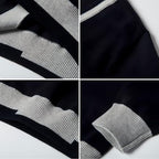 Everanne unisex black V-neck pullover sweater with stripe trim, cotton material, and windproof cuffs.