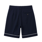 Close-up of the clean finish and structured cotton-blend fabric texture of Everanne navy blue tailored shorts.