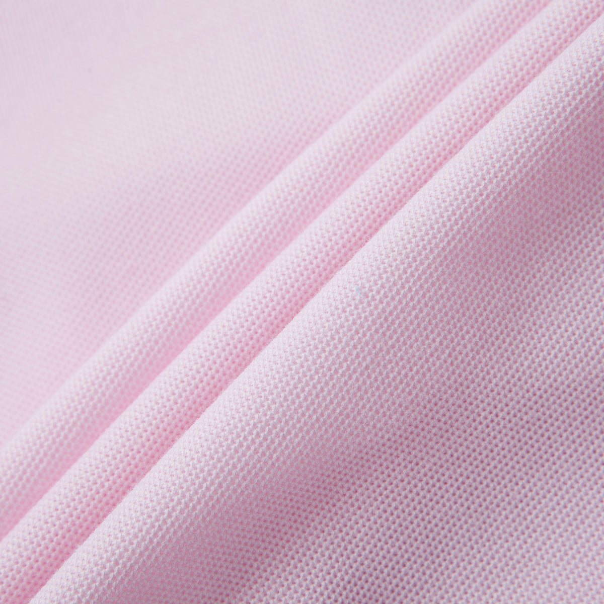 Pink girls' short-sleeve pique mesh T-shirt with crew neck and bow detail by Everanne, shown on a white background.