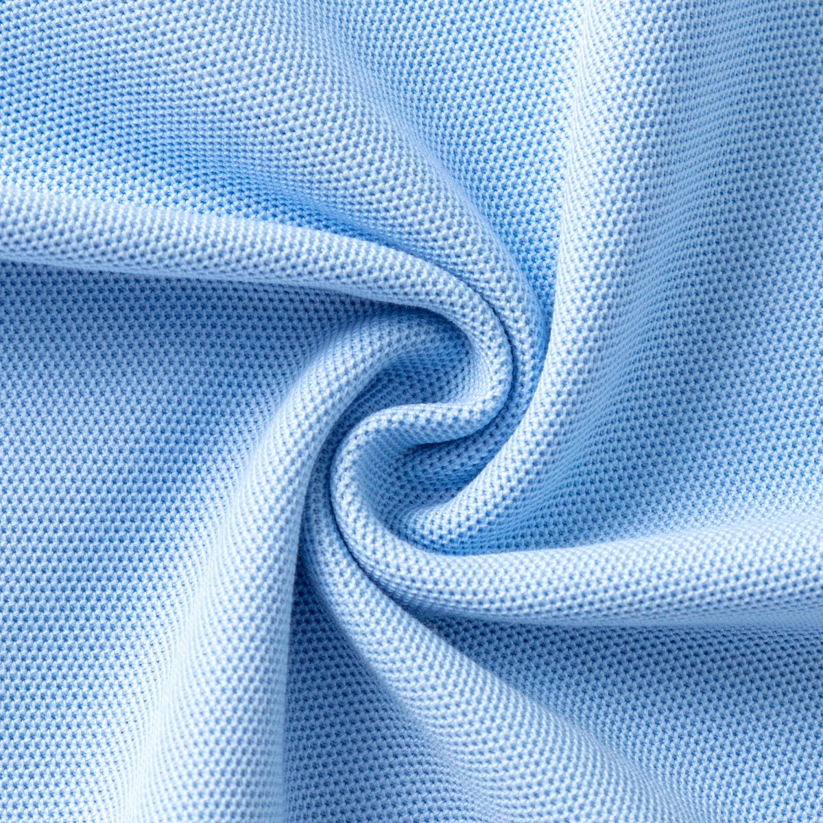 Light blue unisex kids polo shirt by Everanne featuring short sleeves and piqué mesh cotton blend fabric.