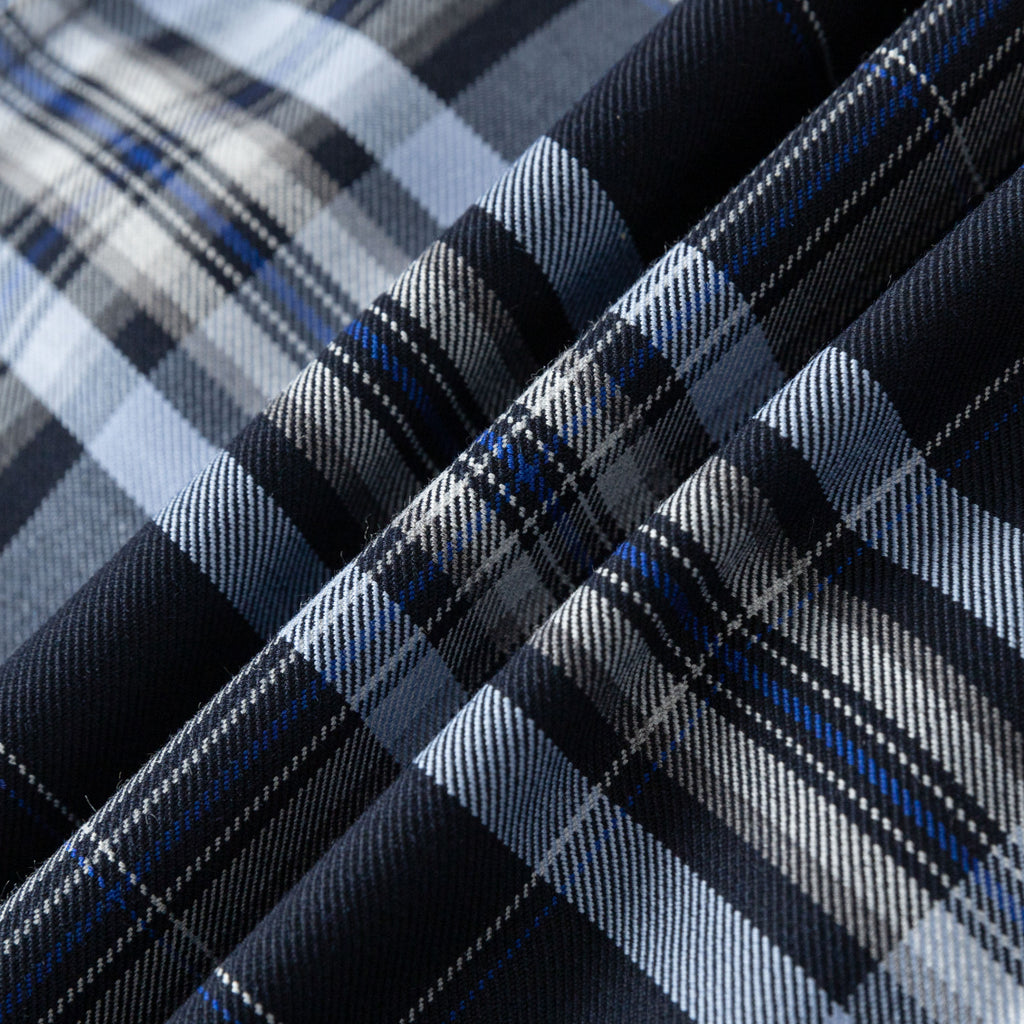 Everanne girls' navy plaid school uniform jumper dress with pleated skirt, featuring a classic, stylish design for school wear.