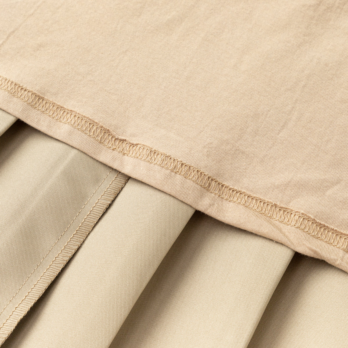Everanne girls' pleated school uniform skirt with elastic waist, khaki color, organic lining, suitable for school wear.