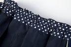 Everanne girls' navy mini skirt with bow tie belt, lightweight twill fabric, perfect for school or casual wear.