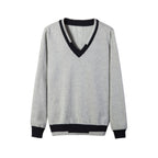 Unisex V-neck pullover sweater in soft cotton with contrast stripe trim and windproof ribbed cuffs.